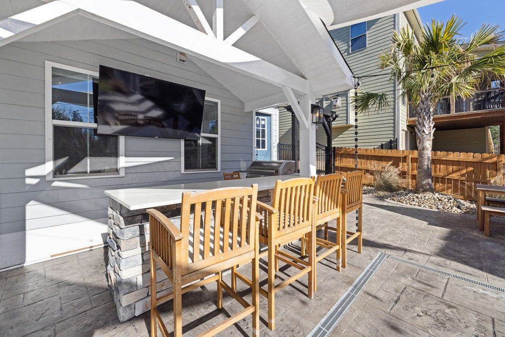 How to Mount a Full-Sun Outdoor TV in a Pool Area to Reduce Glare?